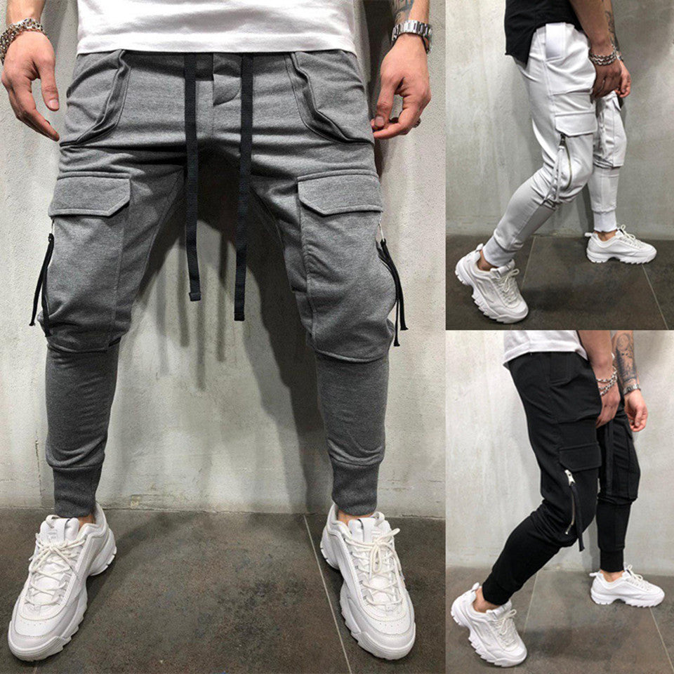 Slim-fit track pants with zipper patch pockets